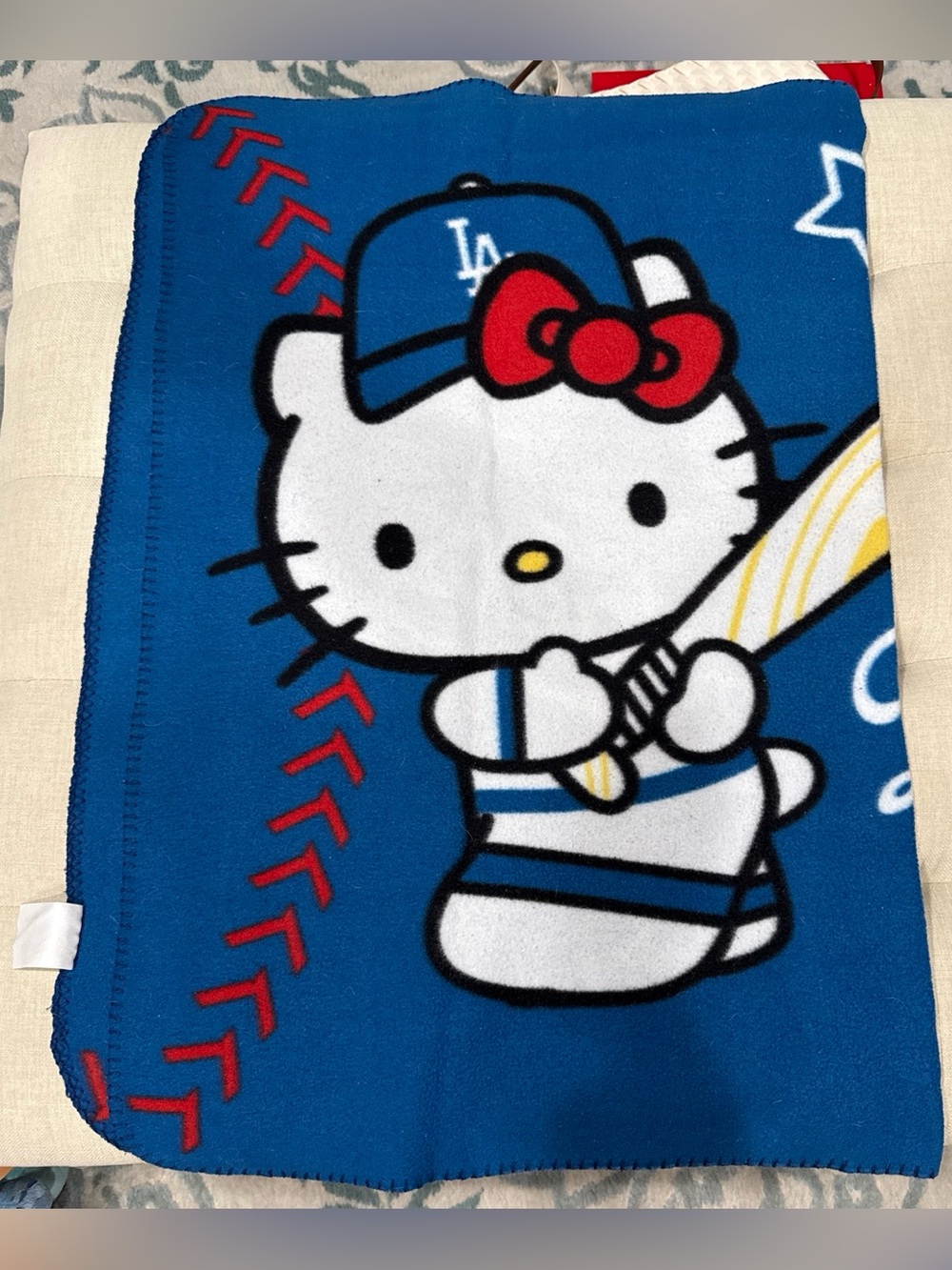 Kids blanket with Hello Kitty baseball design